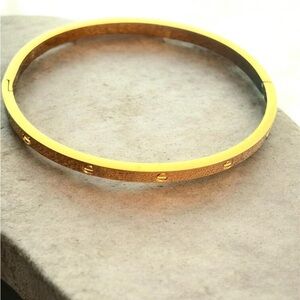 Gold Tone Women's Screw-Detail Bangle Bracelet
